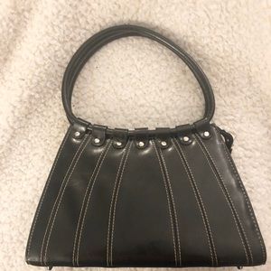 Black studded purse w contrasting white stitching